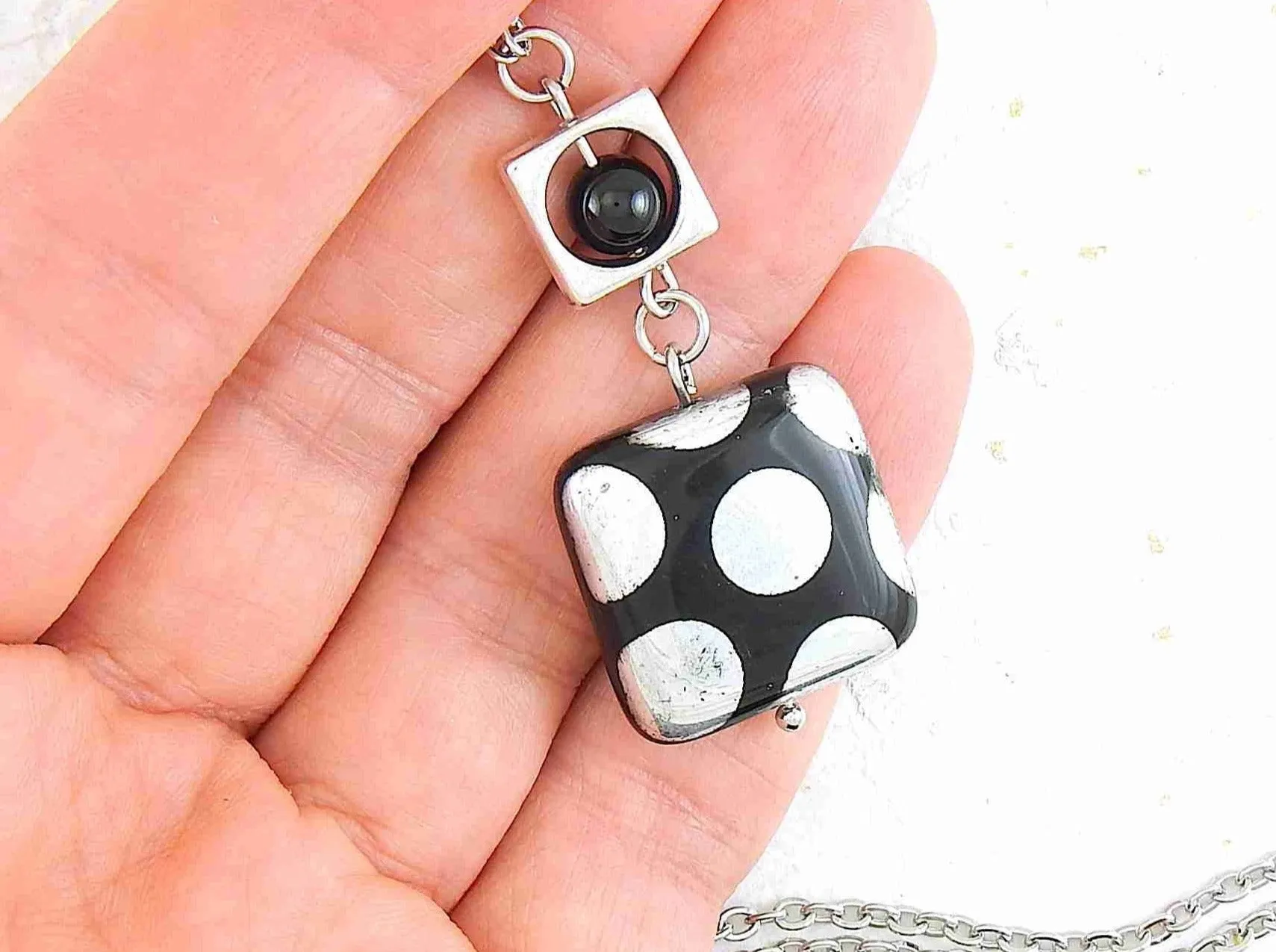 25-inch necklace with black Czech glass square, copper or silver polka dots, matching stainless steel chain