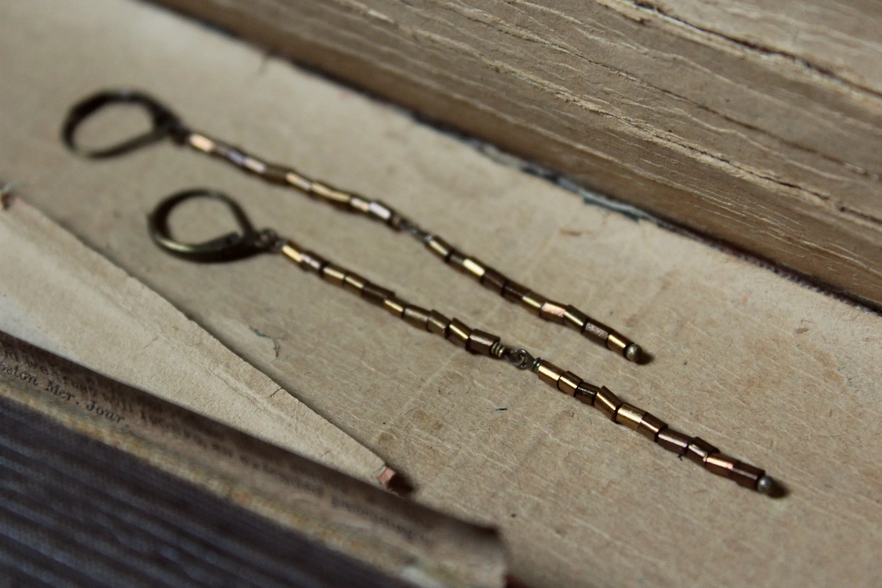 Branchlet. Rustic Metallic Copper Bronze Tube Bead Linear Earrings.
