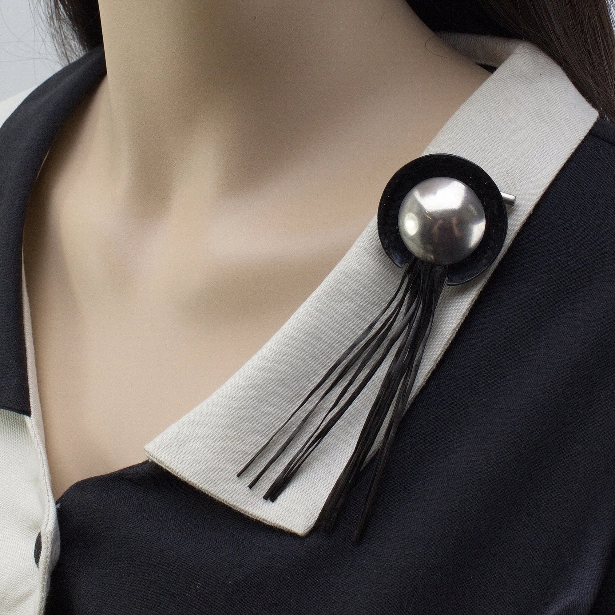 'FLARE' handmade sterling silver brooch with black carbon fibre