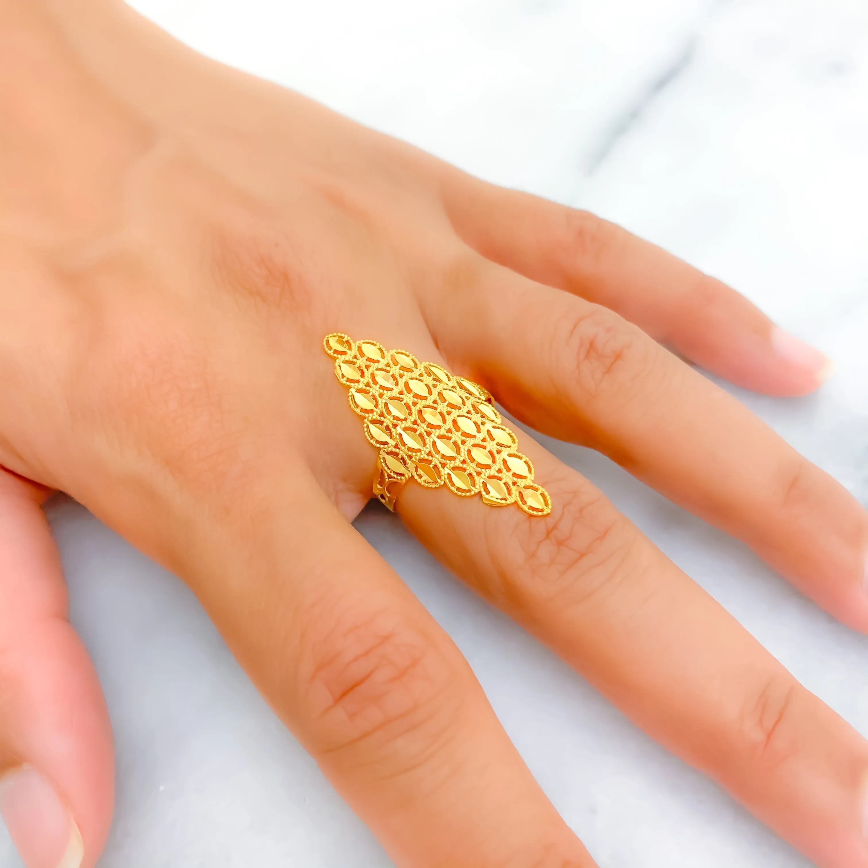 Glimmering Beveled 21k Gold Rich Ring