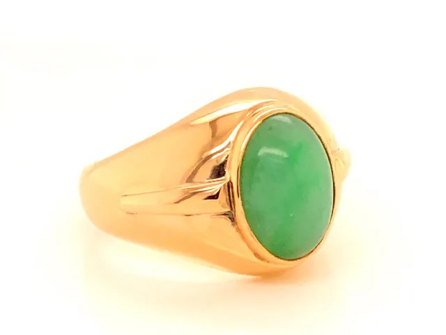 Green Jade Ring with Raised Design Element