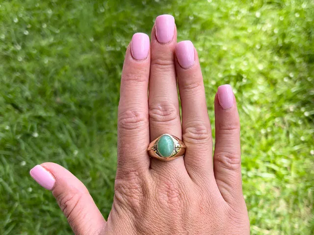 Green Jade Ring with Raised Design Element