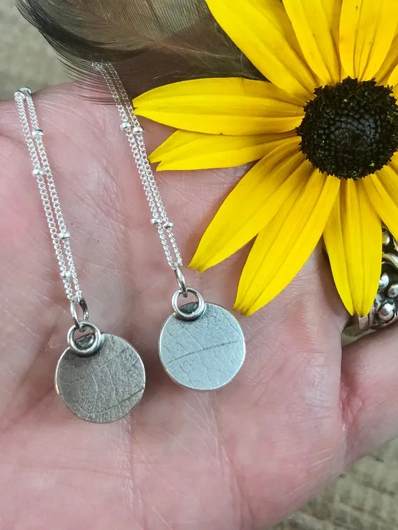 Hand Cast Mini skull face Necklace