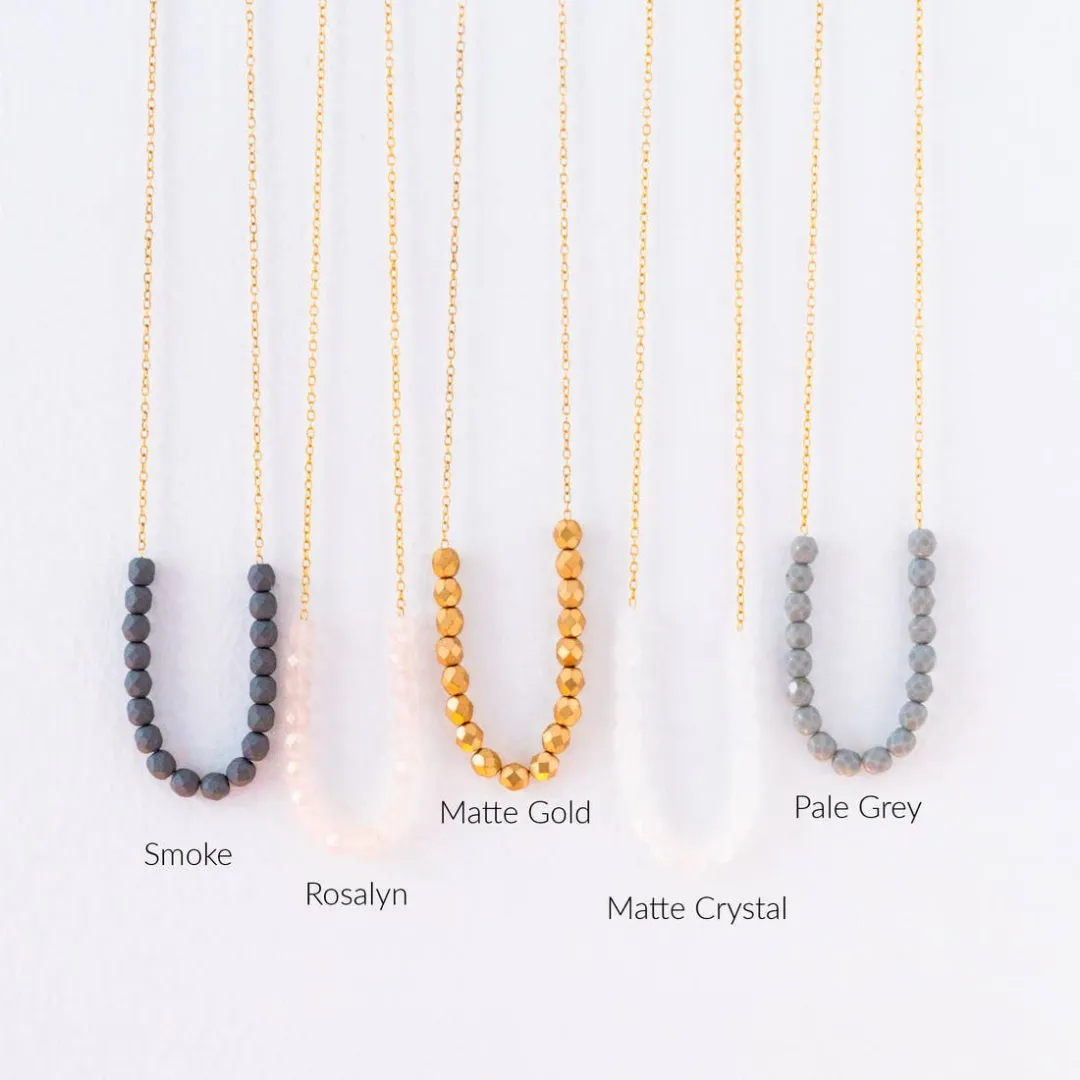 Long Gold Bead Necklace