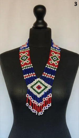 Long kuchi beaded necklace with tribal geometric patterns, made from miniature beads