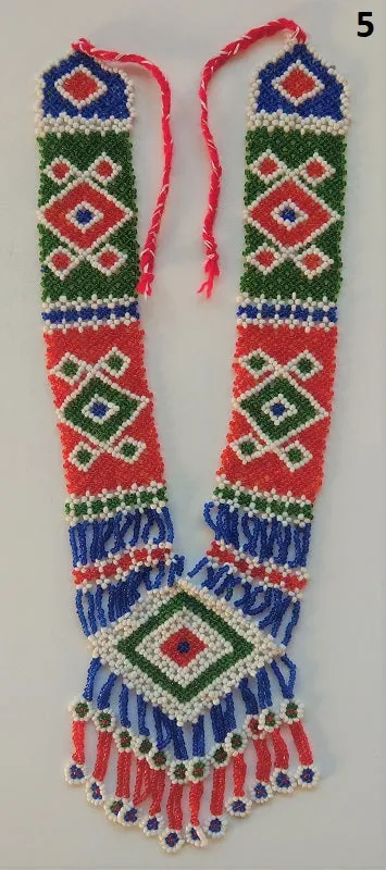 Long kuchi beaded necklace with tribal geometric patterns, made from miniature beads