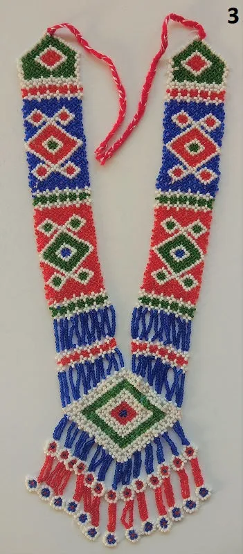 Long kuchi beaded necklace with tribal geometric patterns, made from miniature beads