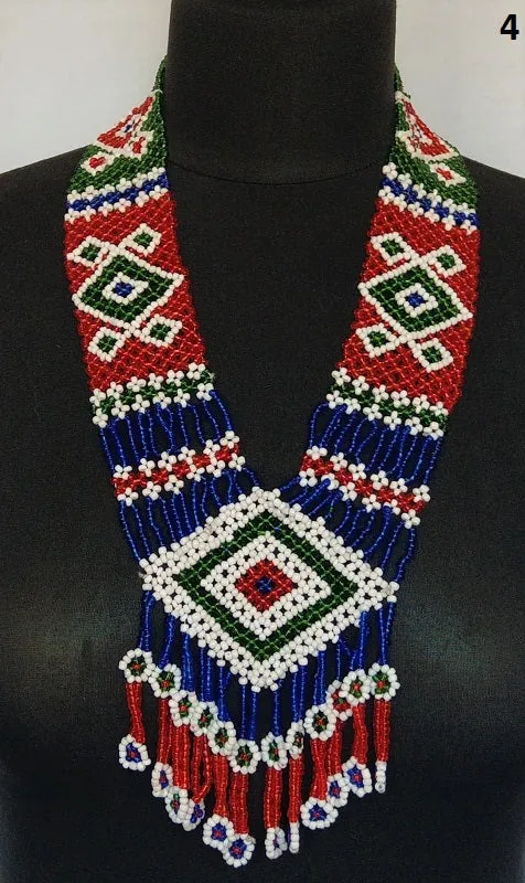 Long kuchi beaded necklace with tribal geometric patterns, made from miniature beads