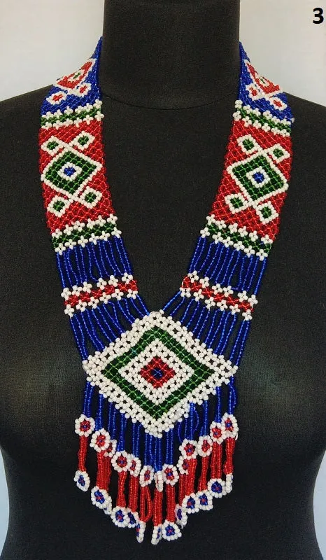 Long kuchi beaded necklace with tribal geometric patterns, made from miniature beads