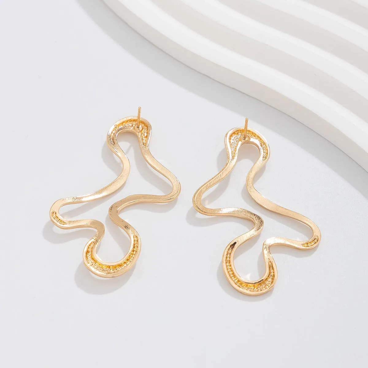 Minimalist Irregular Hollow Pattern Stud Earrings