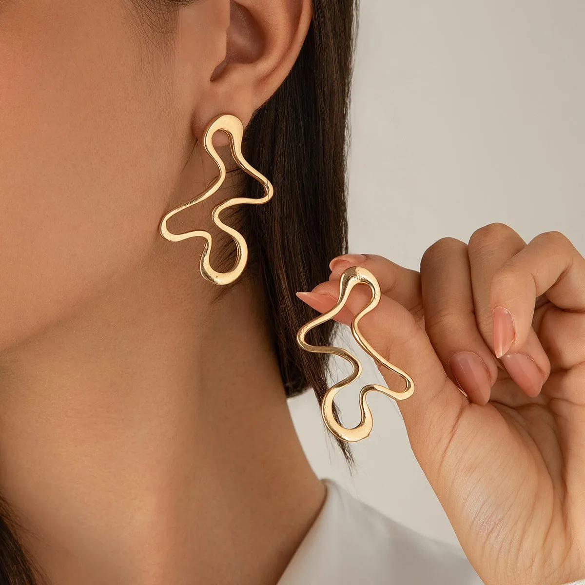 Minimalist Irregular Hollow Pattern Stud Earrings