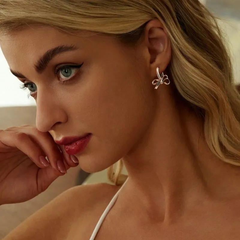Silver Bow Dangle Earrings