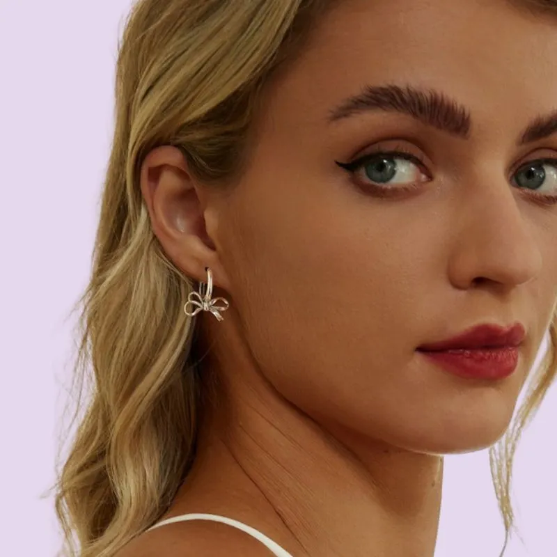 Silver Bow Dangle Earrings