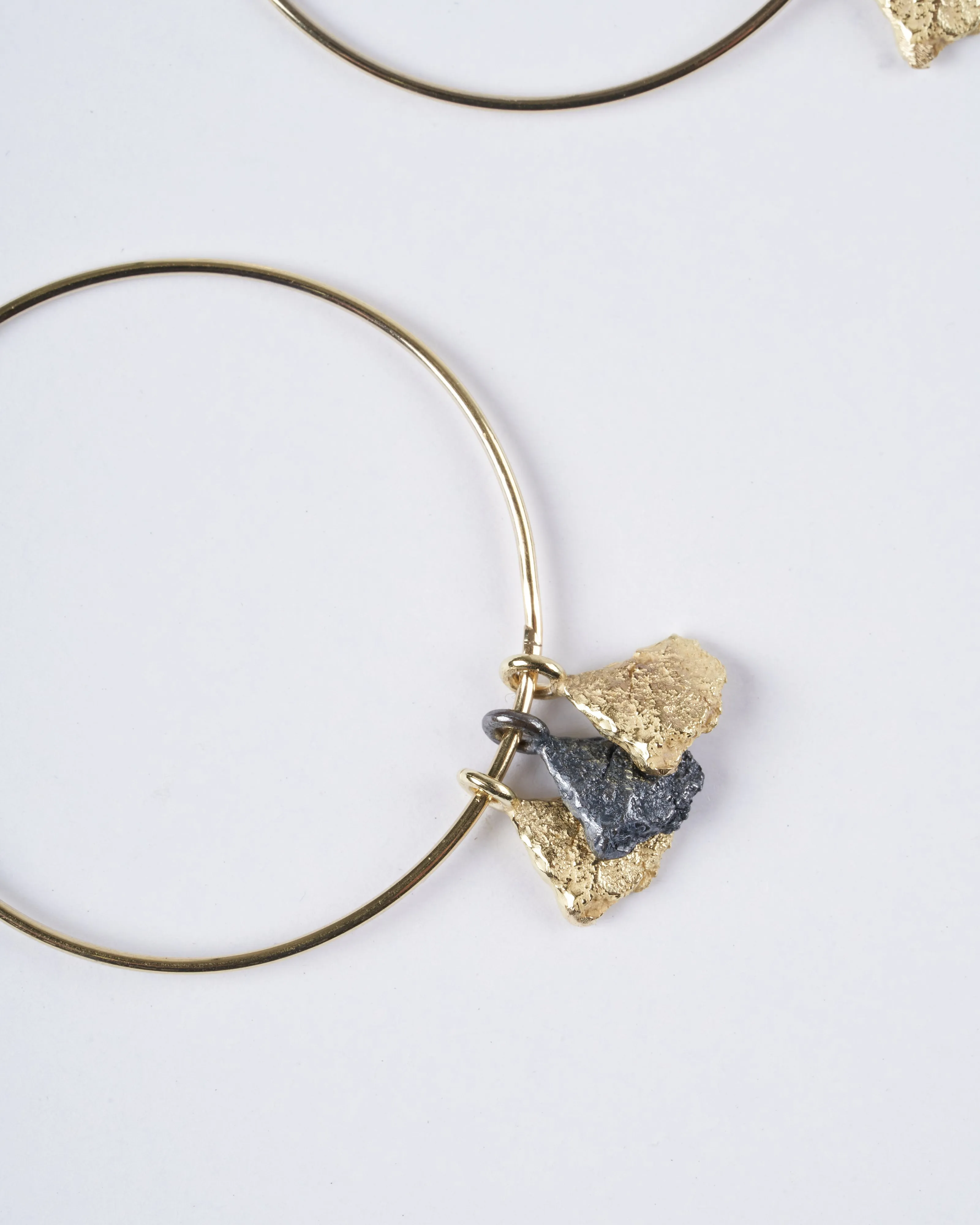 svelare earrings - 18k yellow gold, blackened sterling silver