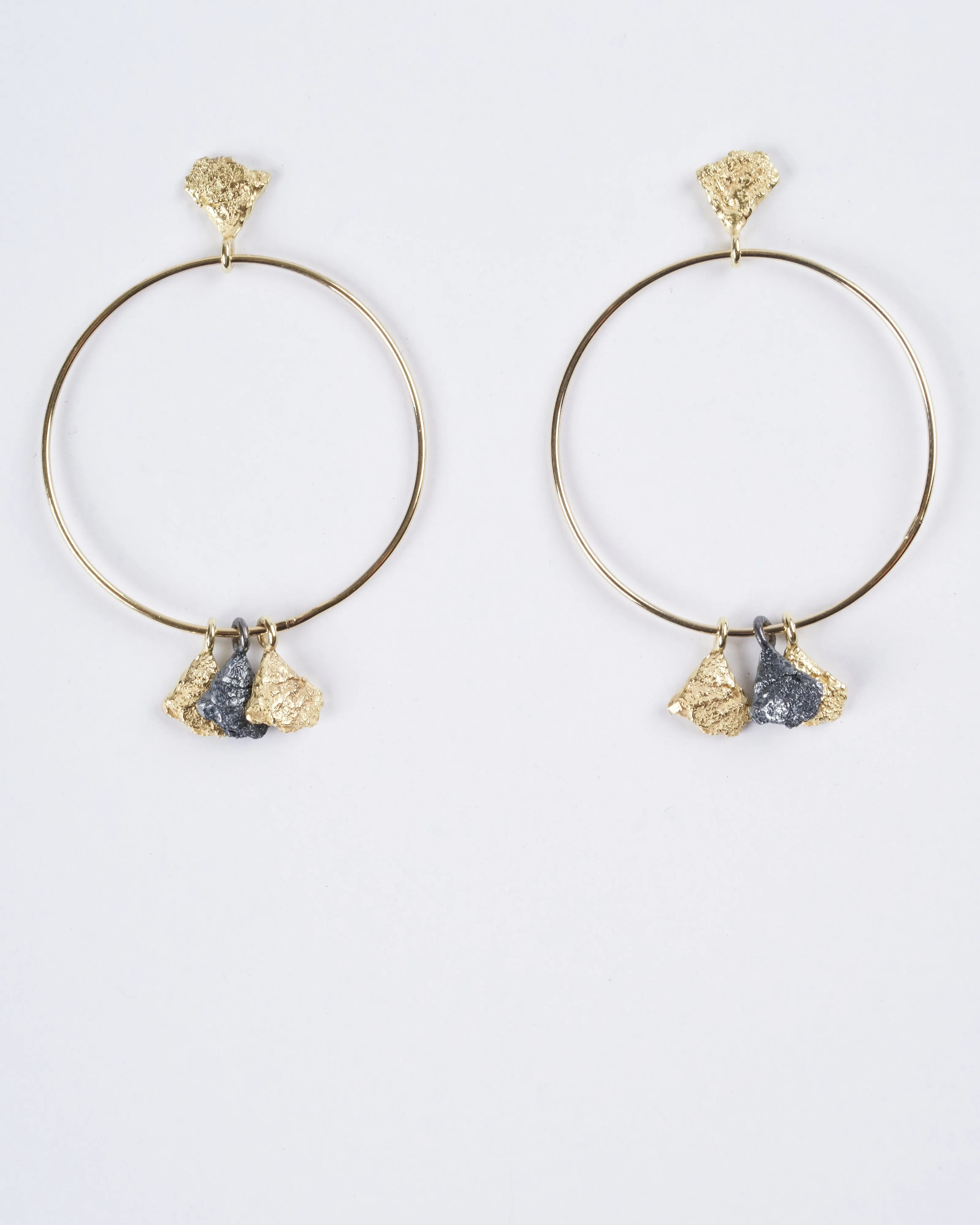 svelare earrings - 18k yellow gold, blackened sterling silver