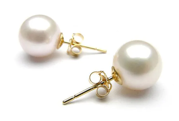 Tiny pearl stud earrings in white gold