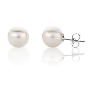 Tiny pearl stud earrings in white gold
