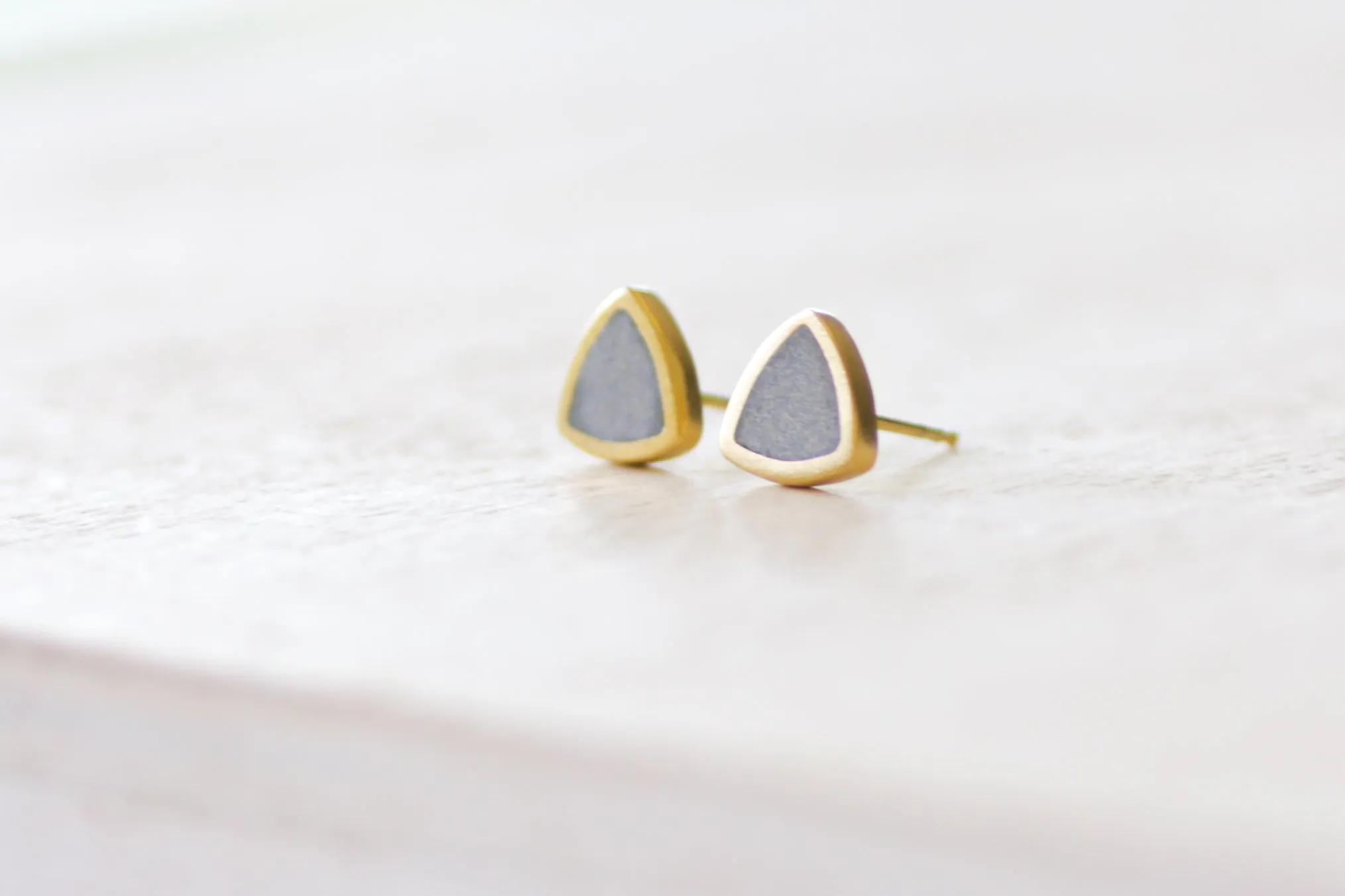 Triangular Gold And Concrete Studs